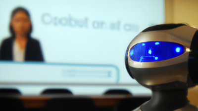 DALL·E-2023-04-27-12.26.56-A-ChatGPT-Robot-in-front-of-a-Training-Class-adults-in-a-futuristic-look.